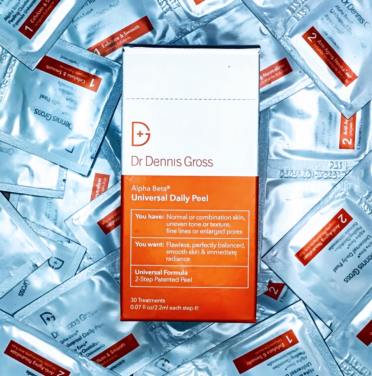 Dr Dennis Gross Alpha Beta Universal Daily Peel box on a bed of foil sachets